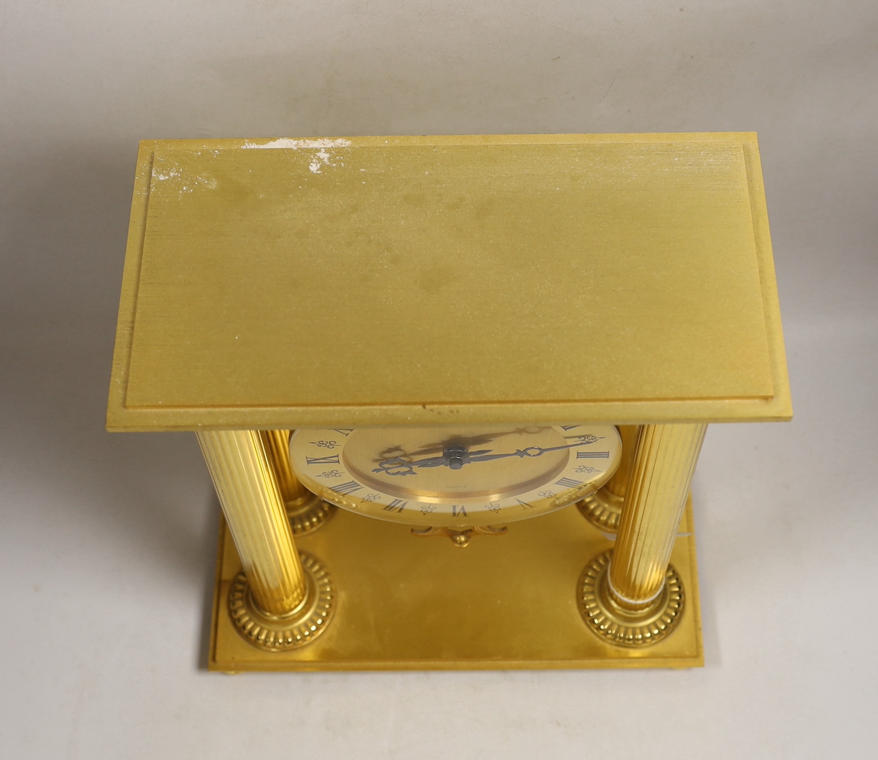 A contemporary Hour Lavigne gilt metal cased quartz mantel clock, 28cm x 23cm